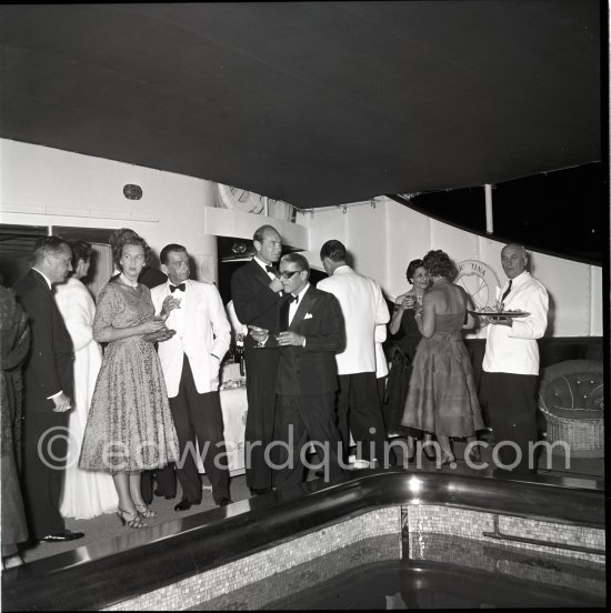 Aristotle Onassis. Cocktail on his yacht Christina. Monaco harbor 1954. - Photo by Edward Quinn