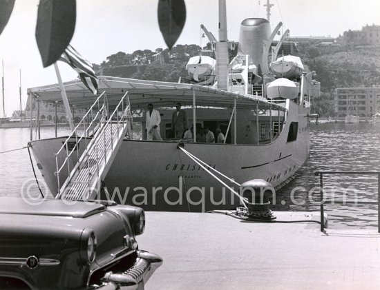 Aristotle Onassis on his yacht Christina. Monaco harbor 1954. - Photo by Edward Quinn