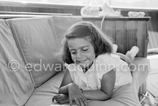 Christina Onassis, daughter of Aristotle and Tina Onassis, on board Onassis\' yacht Christina. Monaco harbor 1957. - Photo by Edward Quinn