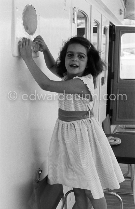 Christina Onassis, daughter of Aristotle and Tina Onassis, on board Onassis\' yacht Christina. Monaco harbor 1957. - Photo by Edward Quinn