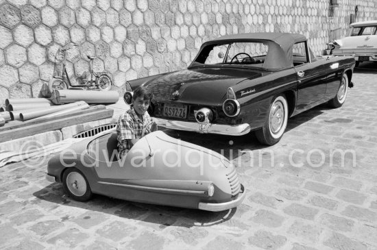 Aristotle Onassis and Tina Onassis\' son Alexander. Monaco harbor 1957. Onassis\' car: 1955 Ford Thunderbird convertible hardtop - Photo by Edward Quinn