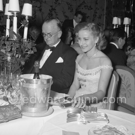 Tina Onassis and her guest, Mr. Jacks. "Bal de la Rose" gala dinner at the International Sporting Club in Monte Carlo, 1956. - Photo by Edward Quinn
