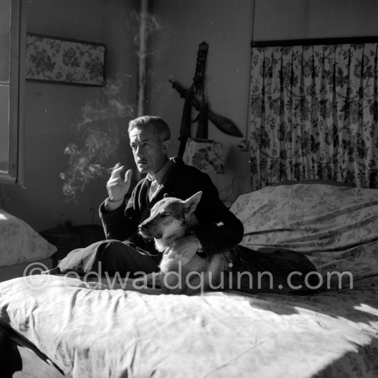 French explorer Michel Perrin, who sought the source of the Amazon, with his German Shepherd Dog Fido. Golfe-Juan 1953. - Photo by Edward Quinn