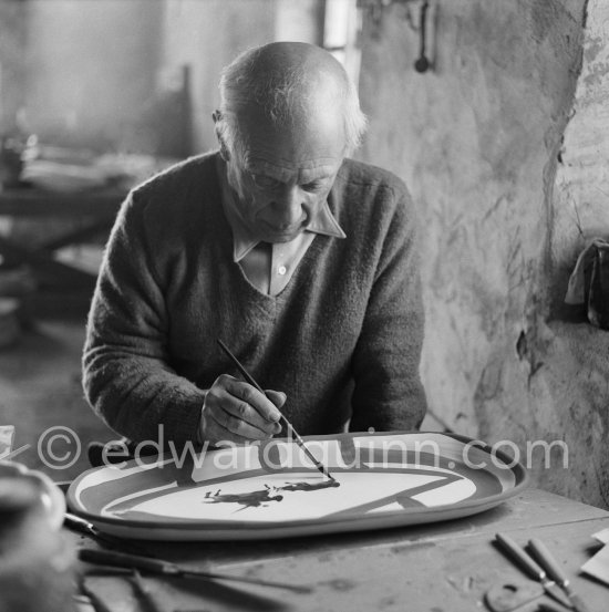 Pablo Picasso works on "Le picador" at the Madoura pottery. Vallauris 23.3.1953. - Photo by Edward Quinn