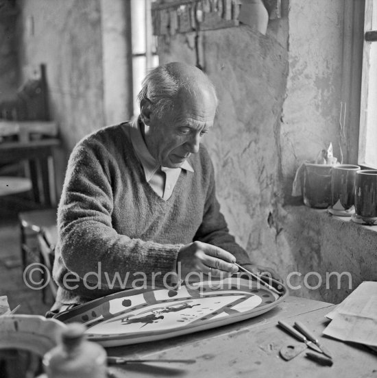 Pablo Picasso works on "Le picador" at the Madoura pottery. Vallauris 23.3.1953. - Photo by Edward Quinn