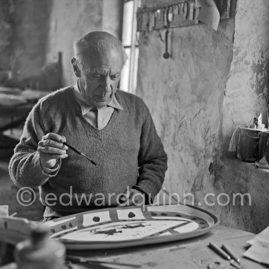 Pablo Picasso works on "Le picador" at the Madoura pottery. Vallauris 23.3.1953. - Photo by Edward Quinn