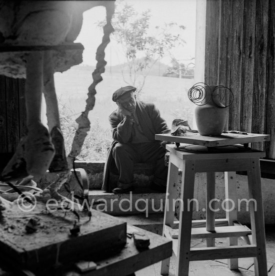 Pablo Picasso at the sculpture studio Le Fournas. On the left part of the sculpture "Petite fille sautant à la corde" (1950). Vallauris 1953. - Photo by Edward Quinn