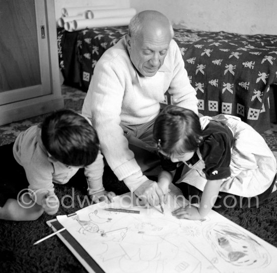 Drawing lesson given by Pablo Picasso to his children Claude Picasso and Paloma Picasso. La Galloise, Vallauris 16.4.1953. - Photo by Edward Quinn