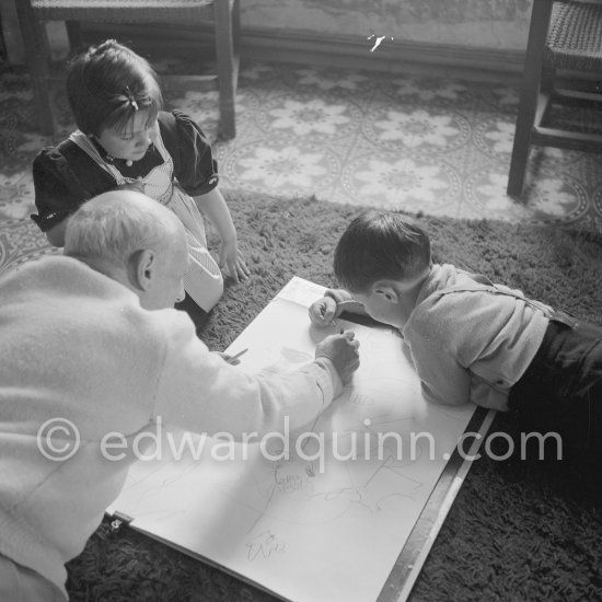 Drawing lesson given by Pablo Picasso to his children Claude Picasso and Paloma Picasso. La Galloise, Vallauris 16.4.1953. - Photo by Edward Quinn