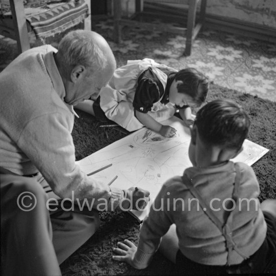 Drawing lesson given by Pablo Picasso to his children Claude Picasso and Paloma Picasso. La Galloise, Vallauris 16.4.1953. - Photo by Edward Quinn