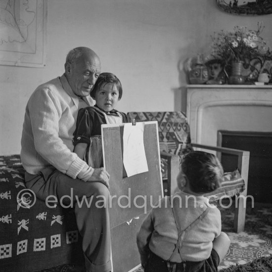 Drawing lesson given by Pablo Picasso to his children Claude Picasso and Paloma Picasso. Villa la Galloise. Vallauris 1953. - Photo by Edward Quinn