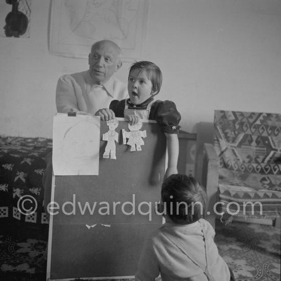 Claude Picasso drawing a portrait of his father. Drawing lesson given by Pablo Picasso to his children Claude Picasso and Paloma Picasso. La Galloise, Vallauris 16.4.1953. - Photo by Edward Quinn