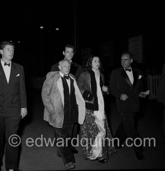 Paulo Picasso and Pablo Picasso, Yves Montand, Françoise Gilot, Henri-Georges Clouzot (from left) at the Cannes Film Festival for a screening of "Le salaire de la peur". Françoise Gilot is wearing the Polish coat given to her by Pablo Picasso. Cannes April 16, 1953. - Photo by Edward Quinn