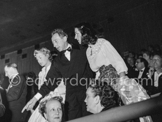 Françoise Gilot and Jean Cocteau. Cannes Film Festival for presentation of "Le salaire de la peur", general view inside Palais du Festival. Cannes 1953. - Photo by Edward Quinn