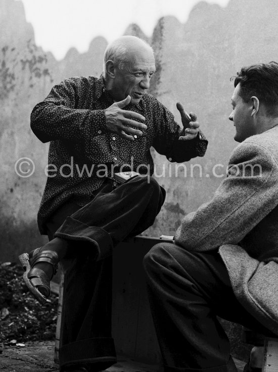 Pablo Picasso and a visitor at Studio Le Fournas. Vallauris 1953. - Photo by Edward Quinn