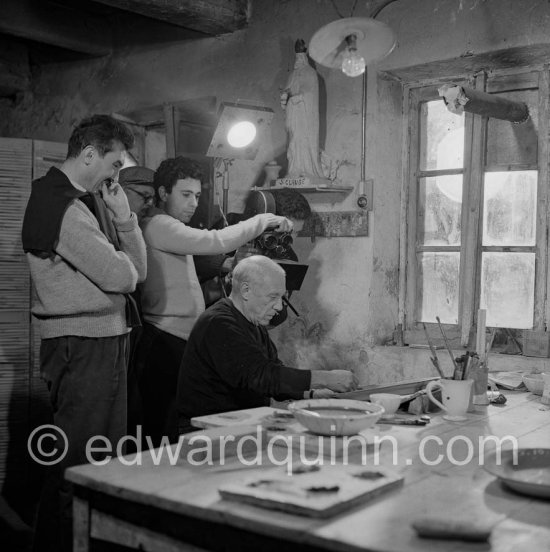 Pablo Picasso working on first version of plate of a woman (Irène Rignault, Madame X), during filming of "Pablo Picasso", directed by Luciano Emmer. Madoura pottery, Vallauris 14.10.1953. - Photo by Edward Quinn