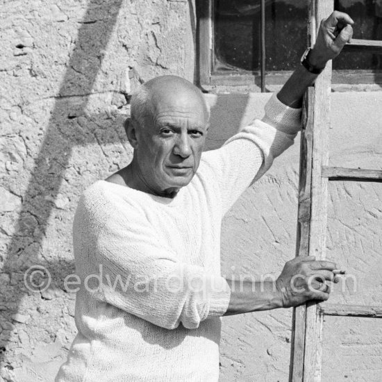 Pablo Picasso with ladder outside his sculpture studio Le Fournas, Vallauris 1953. - Photo by Edward Quinn