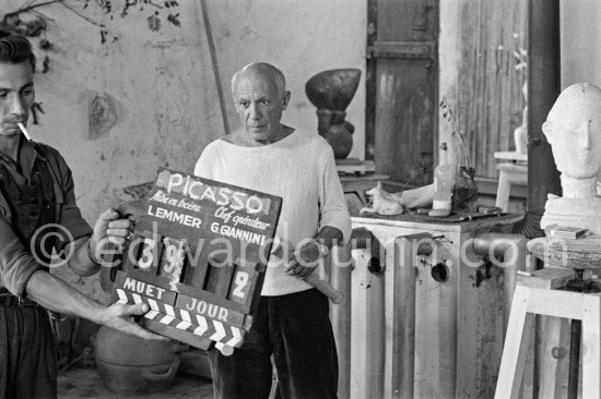 Clapperboard for the film directed by Luciano Emmer. Pablo Picasso working in his sculpture studio Le Fournas making a sculpture figure with odds and ends from his scrap heap. The finished sculpture got the name "La femme à la clé (La Taulière)" ("Woman with a key"). Le Fournas, Vallauris 1953. - Photo by Edward Quinn