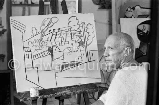 Pablo Picasso doing a charcoal drawing of the view from Le Fournas during filming of Luciano Emmer\'s documentary. Vallauris 26.6.1953. - Photo by Edward Quinn