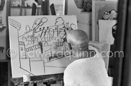 Pablo Picasso doing a charcoal drawing of the view from Le Fournas during filming of Luciano Emmer\'s documentary. Vallauris 26.6.1953. - Photo by Edward Quinn