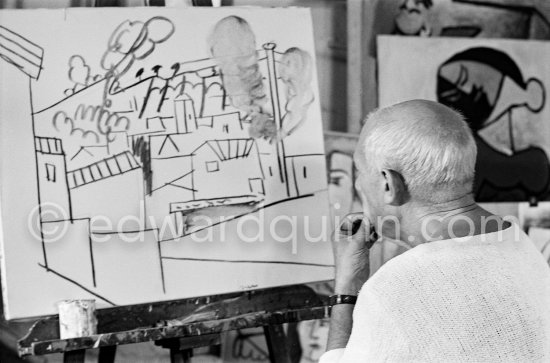 Pablo Picasso doing a charcoal drawing of the view from Le Fournas during filming of Luciano Emmer's documentary. Vallauris 26.6.1953. - Photo by Edward Quinn