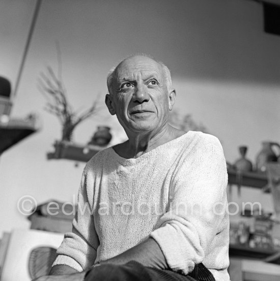 Portrait of Pablo Picasso in white pullover at his studio Le Fournas. Vallauris 1953. - Photo by Edward Quinn