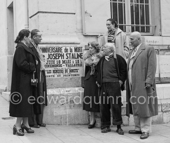 Poster for Stalin\'s first death anniversary. Pablo Picasso with a Sovjet Film delegation: Catherine Litvinenko, Sergei Youtkevich, Ljubov Orlova (with fur collar), Klara Luchko, Akaky Khorava. Place de la Liberation, Vallauris 1954. - Photo by Edward Quinn