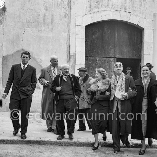 Pablo Picasso with a Sovjet Film delegation. From left Paulo Picasso, Akaky Khorava, Pablo Picasso, unknown man, Ljubov Orlova (with fur collar), Serge Youtkevitch (director), Catherine Litvinenko. In front of Temple de la Paix, (alternate Chapelle de la Paix), today Musée national Pablo Picasso, La Guerre et La Paix, Vallauris 1954. - Photo by Edward Quinn