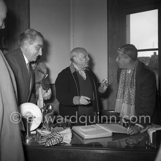 Pablo Picasso signing guestbook. With Sovjet Film delegation Grigori Alexandrov (director) and Serge Youtkevitch (director). Temple de la Paix, (or Chapelle de la Paix), today Musée national Pablo Picasso, La Guerre et La Paix, Vallauris 1954. - Photo by Edward Quinn