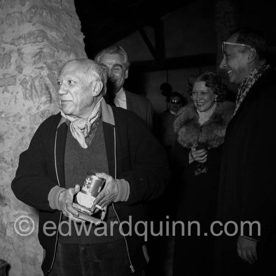 Picasso with Sovjet Film delegation (Serge Youtkevitch, Gregori Alexandrov, Clara Lutchko, Ljubov Orlova (with fur collar), Catherine Litvinienkov, Akaky Khorava). Galerie Madoura, Vallauris 1954. - Photo by Edward Quinn