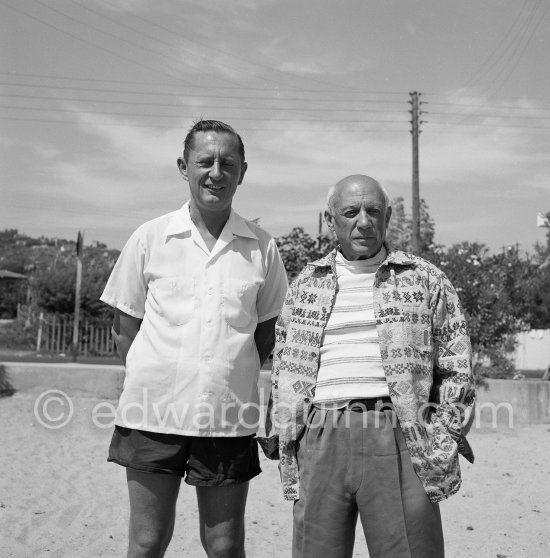Pablo Picasso at the beach with not yet identified person. Cap d’Antibes 1954. - Photo by Edward Quinn
