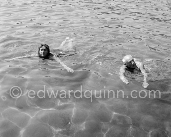 Maya Picasso swimmimg with Pablo Picasso. Beach of Golfe-Juan 1954. - Photo by Edward Quinn