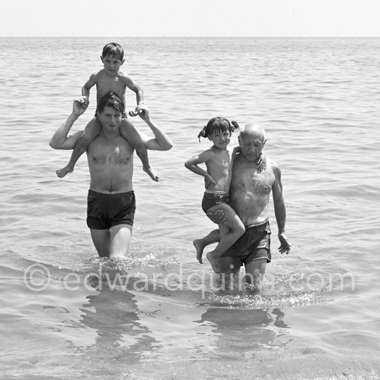 Pablo Picasso with his children Paulo Picasso, Paloma Picasso and Claude Picasso at the beach of Golfe-Juan 1954. - Photo by Edward Quinn