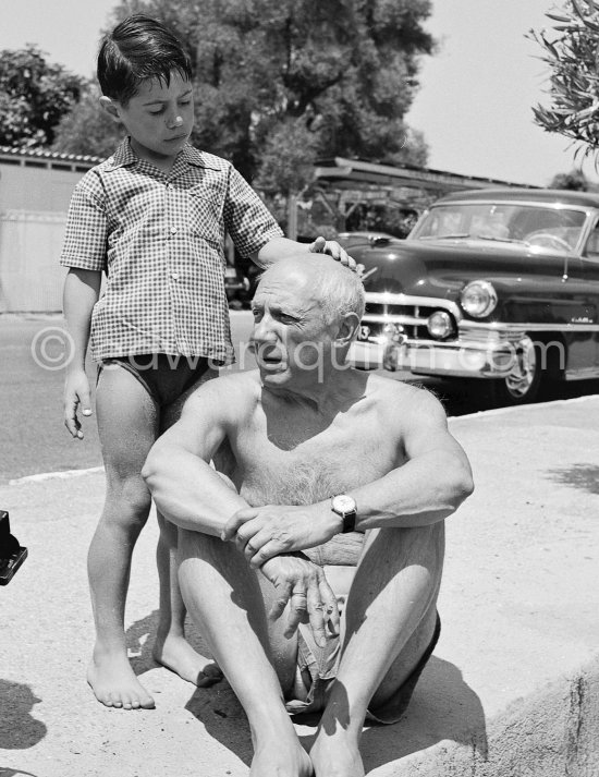 Pablo Picasso with Claude Picasso. Golfe-Juan 1954. Car: Cadillac Fleetwood 1952 - Photo by Edward Quinn