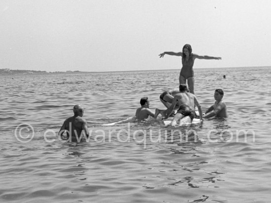 Pablo Picasso (left) Françoise Gilot (on the board), Paulo (right). Golfe-Juan 1954. - Photo by Edward Quinn