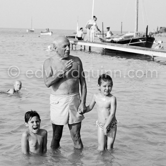 Claude, Paloma. at beach, in the water, Picasso swimming. Golfe-Juan 1954. - Photo by Edward Quinn