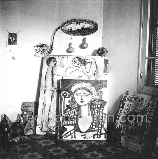 Paintings against a fireplace. La Galloise, Vallauris 1954. - Photo by Edward Quinn