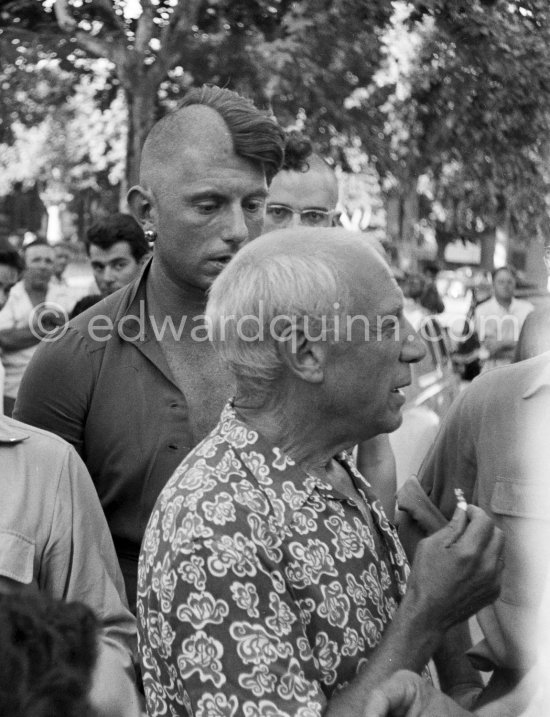 Pablo Picasso, Paulo Picasso and in the background Pierre Baudouin with special haircuts, see Penrose1981, p. 443f. First Corrida of Vallauris, in honor of Pablo Picasso 1954. (1.8.1954). - Photo by Edward Quinn
