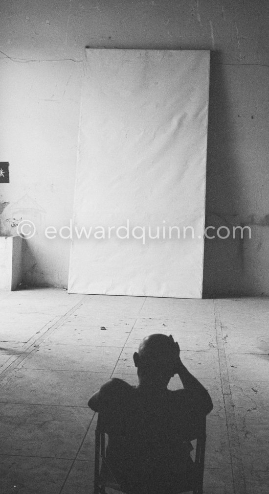 Picasso working on a bucolic pastoral scene on drawing paper which was to serve as background for the film "Le mystère Picasso" by Henri-Georges Clouzot. Nice, Studios de la Victorine 1955. - Photo by Edward Quinn