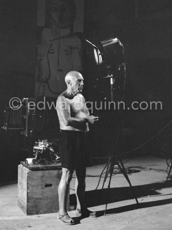 Pablo Picasso working on a bucolic pastoral scene on drawing paper which was to serve as background for the film "Le mystère Picasso" by Henri-Georges Clouzot. Nice, Studios de la Victorine 1955. - Photo by Edward Quinn