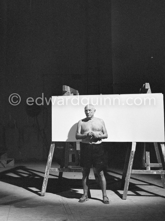 Picasso working on a bucolic pastoral scene on drawing paper which was to serve as background for the film "Le mystère Picasso" by Henri-Georges Clouzot. Nice, Studios de la Victorine 1955. - Photo by Edward Quinn
