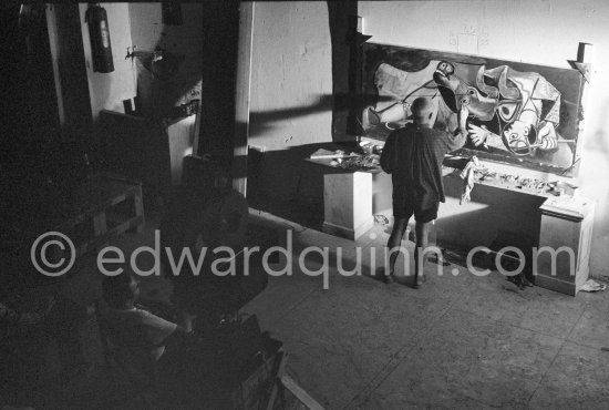 Pablo Picasso portrays a stage in the bullfight when the bullfighter is caught by the horns of the bull. During filming of "Le mystère Picasso". Nice, Studios de la Victorine, 1955. - Photo by Edward Quinn