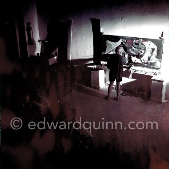 Pablo Picasso portrays a stage in the bullfight when the bullfighter is caught by the horns of the bull. During filming of "Le mystère Picasso". Nice, Studios de la Victorine, 1955. - Photo by Edward Quinn