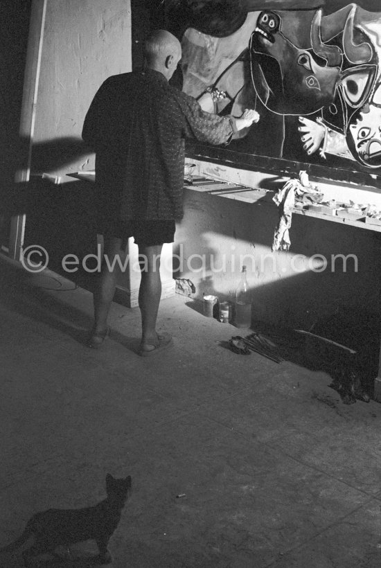 Pablo Picasso portrays a stage in the bullfight when the bullfighter is caught by the horns of the bull. During filming of "Le mystère Picasso". Nice, Studios de la Victorine, 1955. - Photo by Edward Quinn