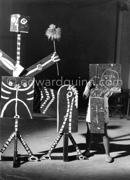 Pablo Picasso with "Centaure" and double mask. Filming of "Le mystère Picasso", Nice, Studios de la Victorine 1955. - Photo by Edward Quinn