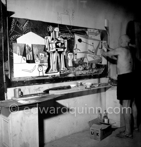 Pablo Picasso painting "La plage à la Garoupe I" for the film "Le mystère Picasso". Nice, Studios de la Victorine, 1955. - Photo by Edward Quinn