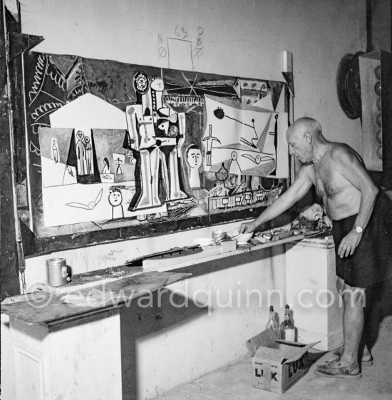 Pablo Picasso painting "La plage à la Garoupe I" for the film "Le mystère Picasso". Nice, Studios de la Victorine, 1955. - Photo by Edward Quinn