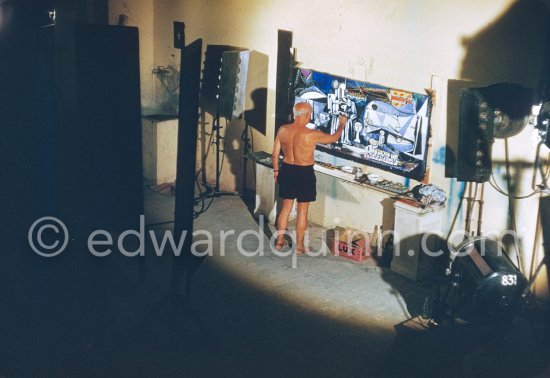 Pablo Picasso painting "La plage à la Garoupe I" for the film "Le mystère Picasso". Nice, Studios de la Victorine, 1955. - Photo by Edward Quinn
