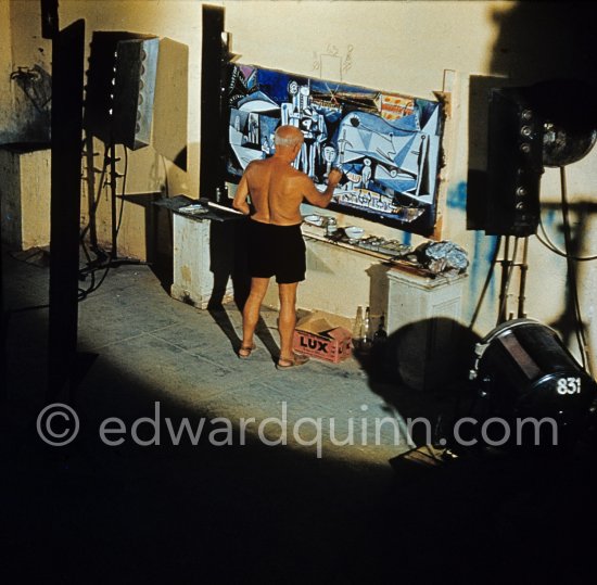 Pablo Picasso painting "La plage à la Garoupe I" for the film "Le mystère Picasso". Nice, Studios de la Victorine, 1955. - Photo by Edward Quinn