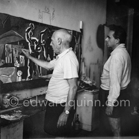 Pablo Picasso and Clouzot. The making of "La plage à la Garoupe I" for the film "Le mystère Picasso". Nice, Studios de la Victorine, 1955. - Photo by Edward Quinn